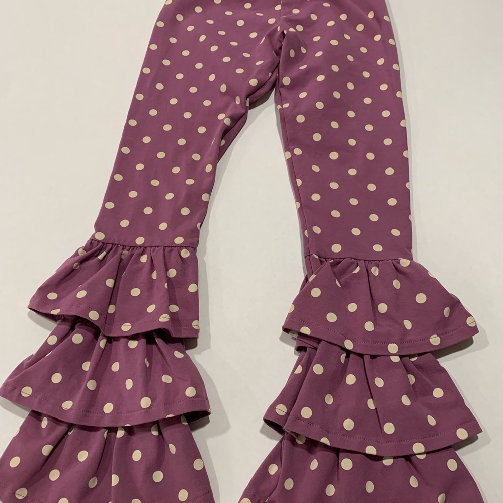 Matilda Jane ruffled pants. Purple w/ white dots and green bows on back of legs.